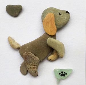 رسم كلب بالحجارة